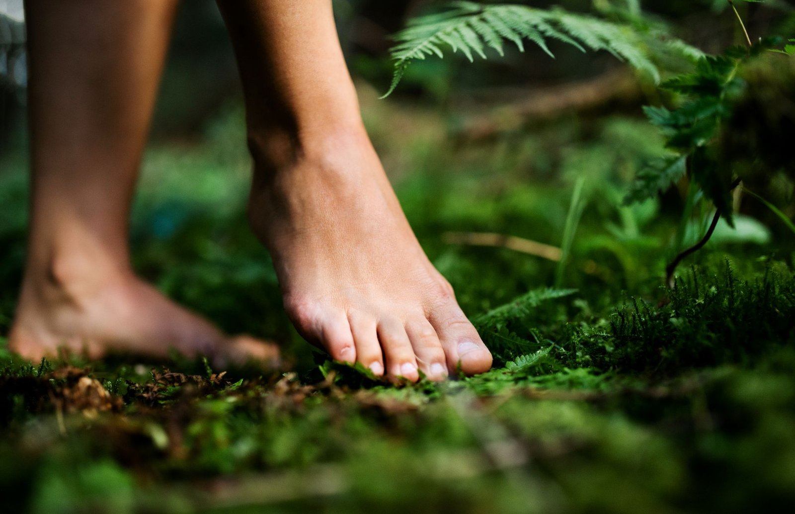 bare-feet-of-woman-standing-barefoot-outdoors-in-n-2024-10-18-09-27-32-utc.jpg